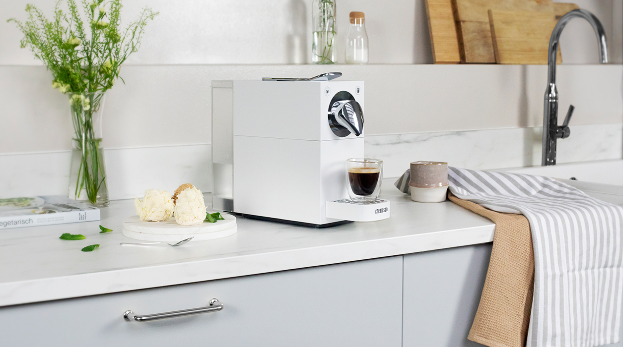 Una coffee machine White in a kitchen 